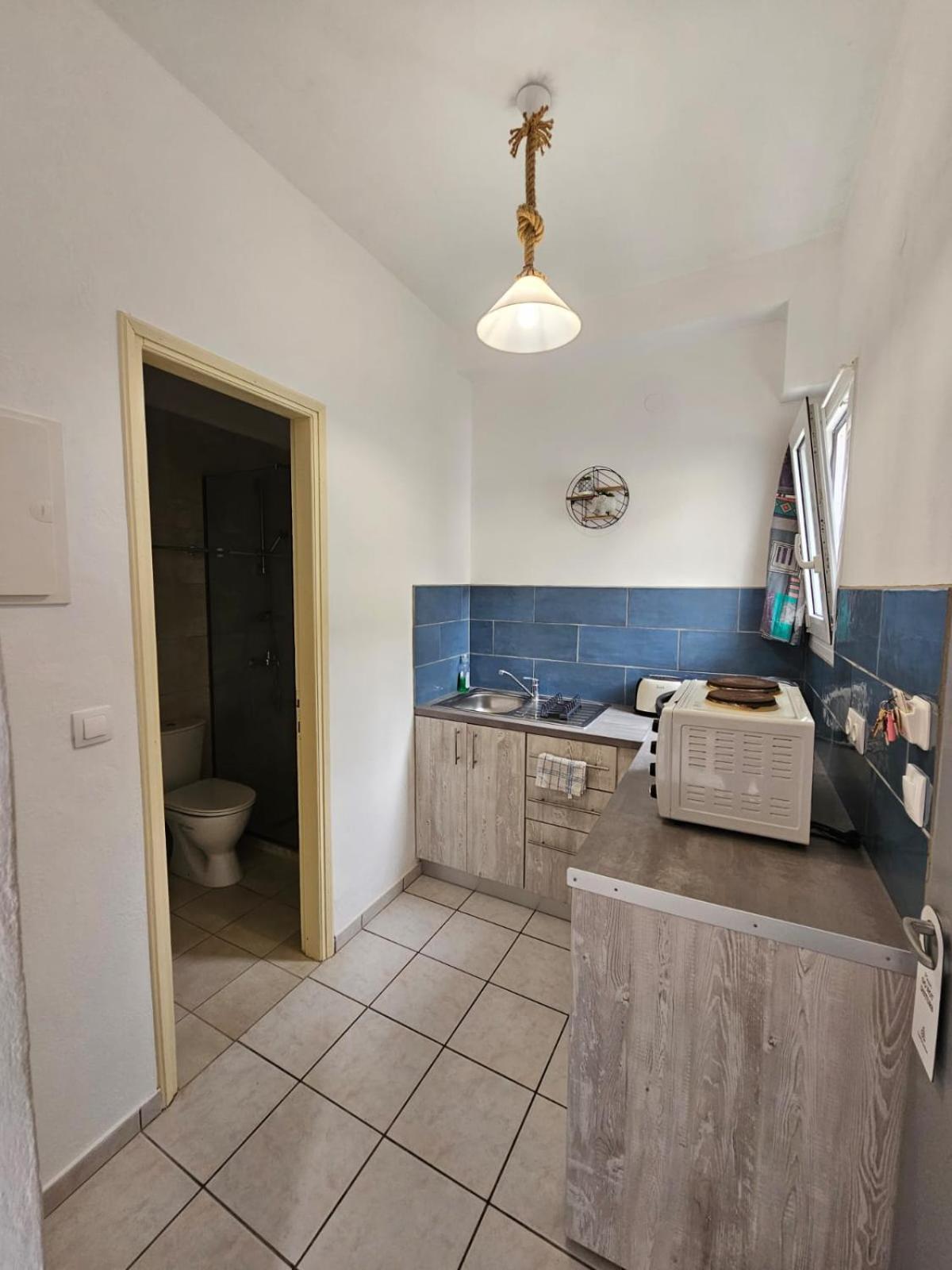 Appartement Gardelis Gardens à Benitses  Chambre photo