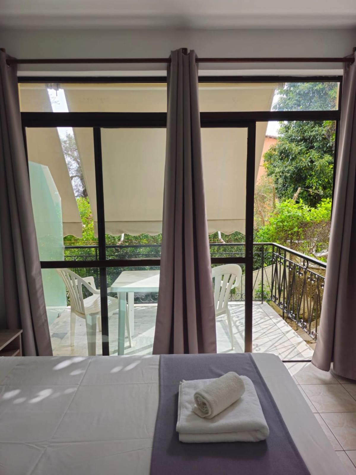 Appartement Gardelis Gardens à Benitses  Chambre photo